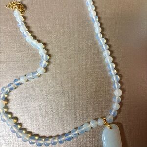 Opalescent Light Blue Beaded Necklace with Gold Accents